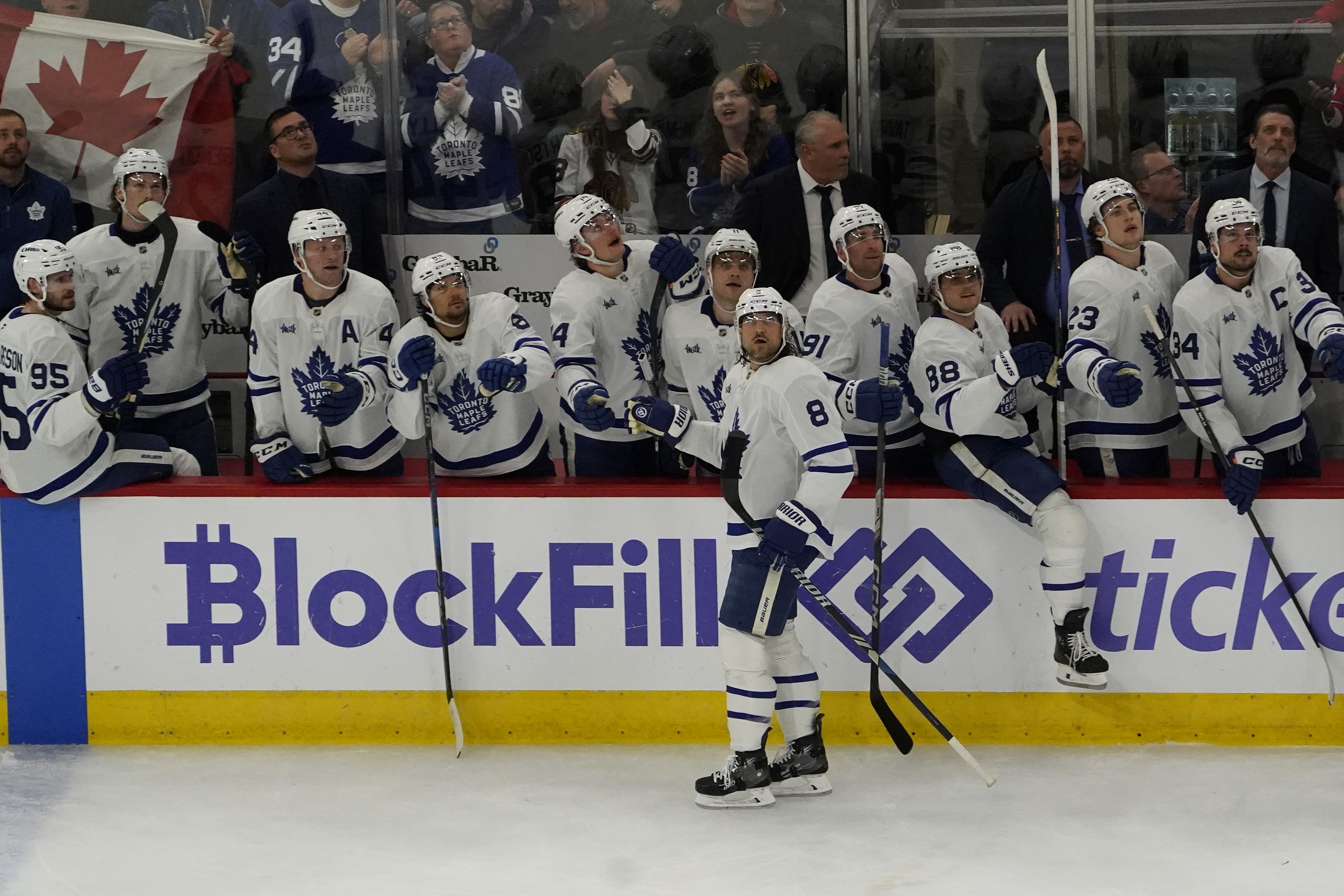 Feb 23, 2025; Chicago, Illinois, USA; Toronto Maple Leafs defenseman Chris Tanev (8) celebrates his goal against the Chicago Blackhawks during the third period at United Center. Mandatory Credit: David Banks-Imagn Images - Source: Imagn