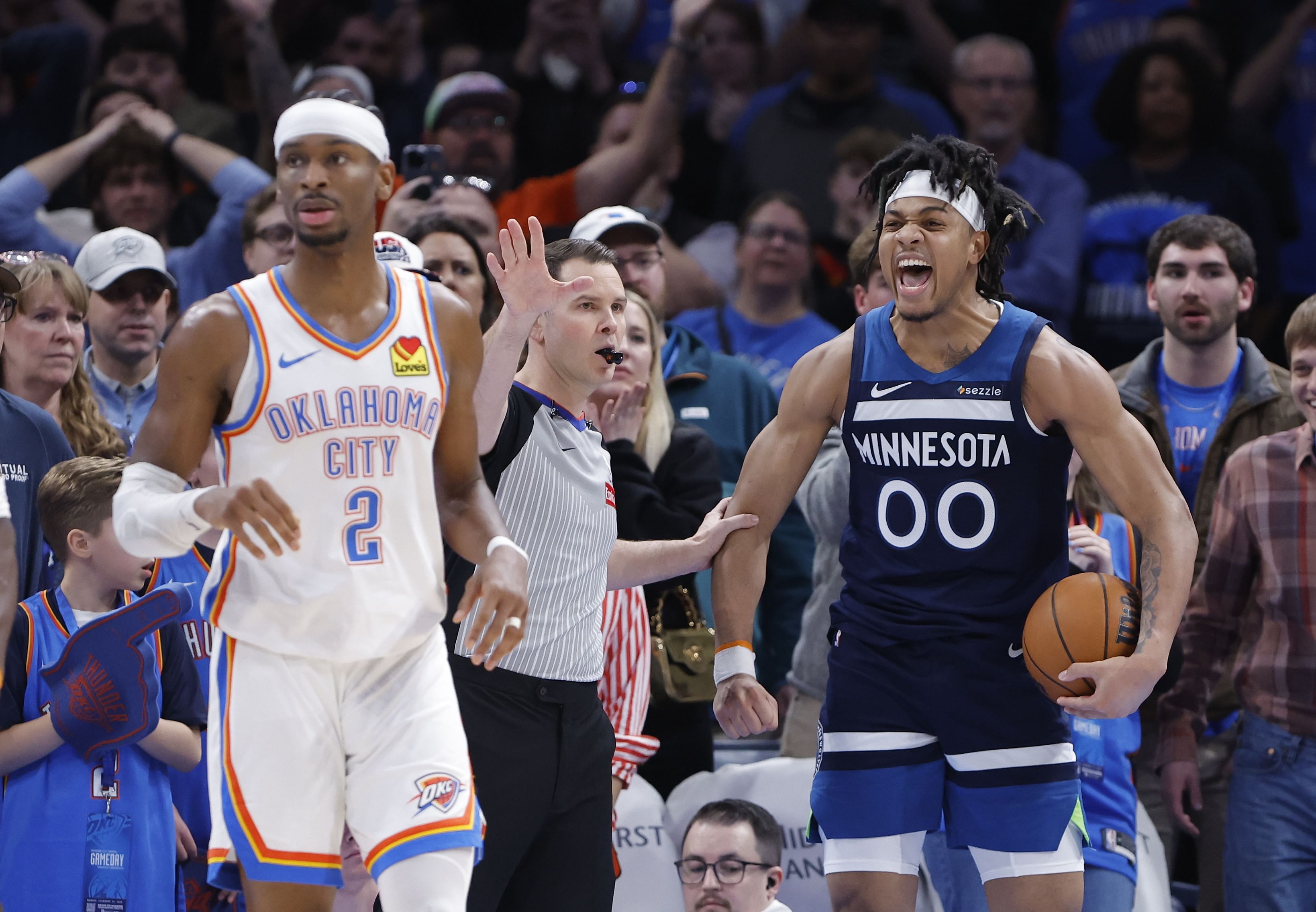 Terrence Shannon Jr. (00) reacts after a play against the Oklahoma City Thunder during the second half at Paycom Center. Mandatory Credit: Alonzo Adams-Imagn Images