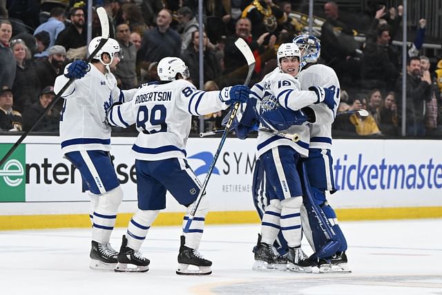 Feb 25, 2025; Boston, Massachusetts, USA; Toronto Maple Leafs right wing Mitch Marner (16) celebrates with his teammates after scoring the game winning goal against the Boston Bruins during an overtime period at the TD Garden. Mandatory Credit: Brian Fluharty-Imagn Images - Source: Imagn