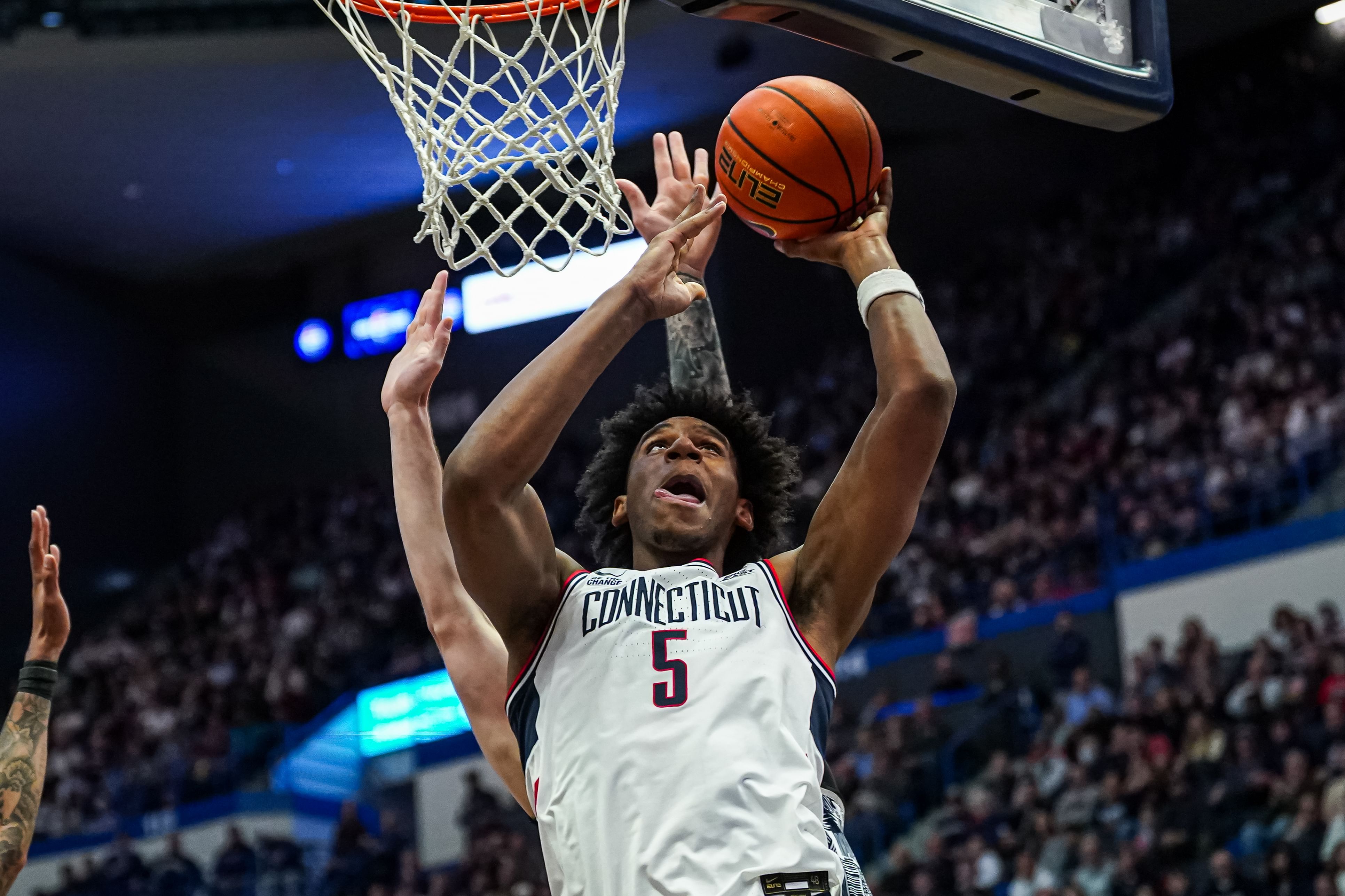 UConn Huskies center Tarris Reed Jr. (5) shoots the ball against the Georgetown Hoyas in the first half at XL Center. Photo: Imagn