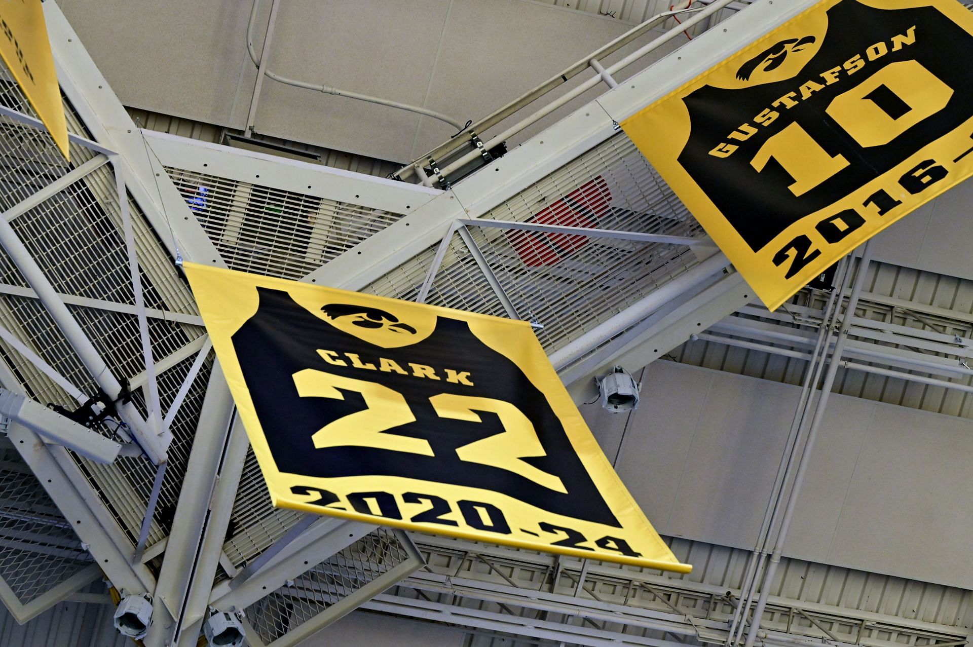 Former Iowa Hawkeyes star Caitlin Clark&#039;s jersey is pulled to the rafter during a special retirement ceremony. (Credits: Getty)