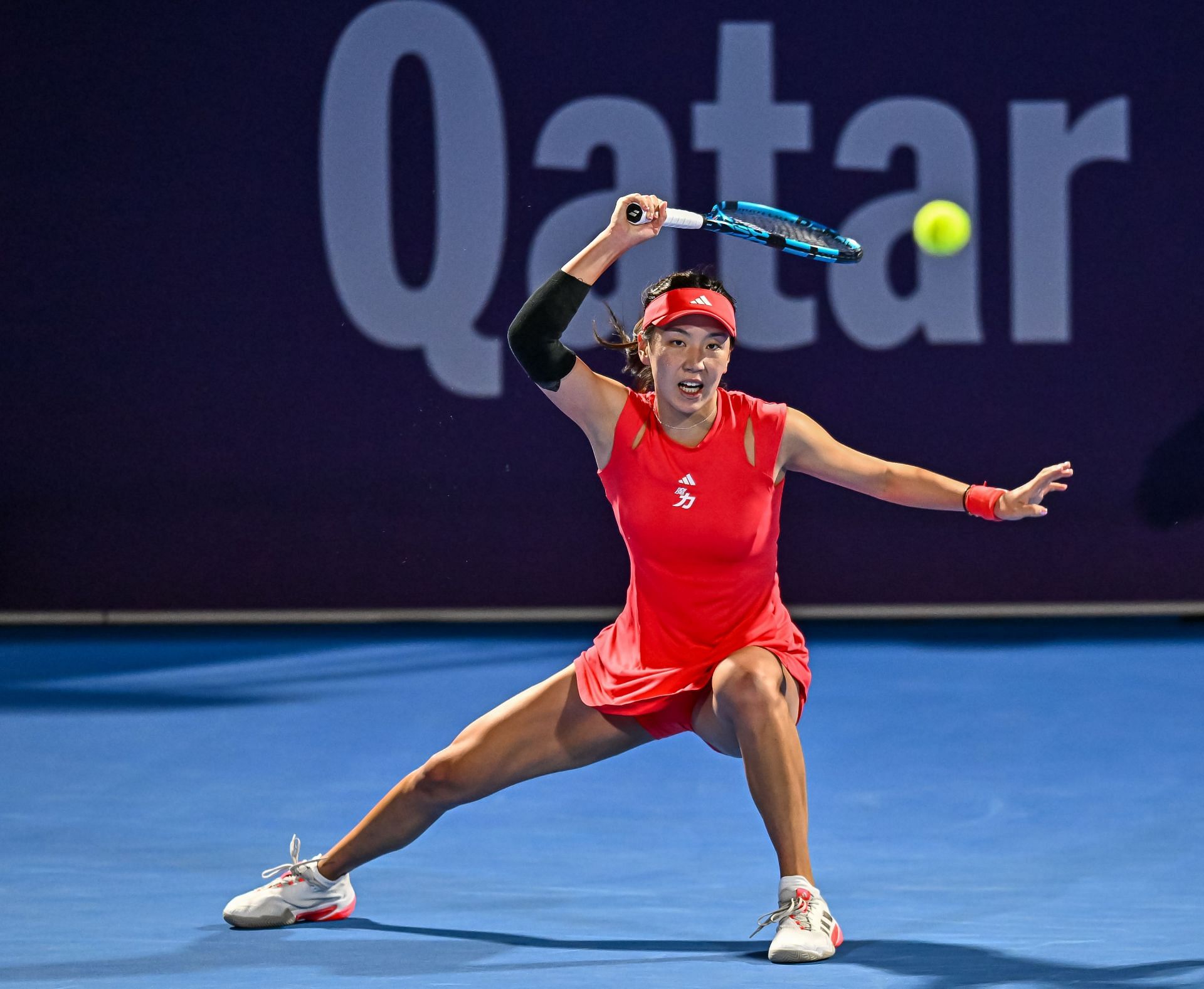 Xinyu Wang of China competes in her first-round match against Elina Avanesyan of Armenia during the WTA Qatar TotalEnergies Open 2025 - Source: Getty