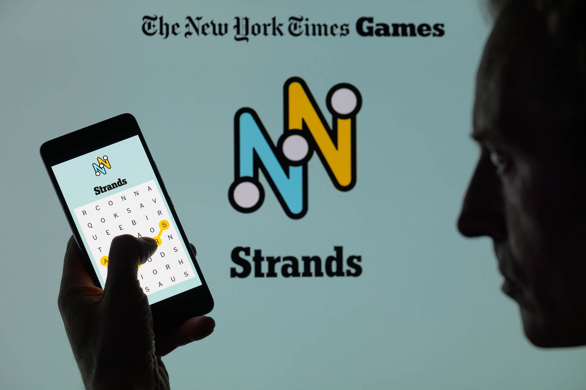 NYT Strands Game - Photo Illustration - Source: Getty