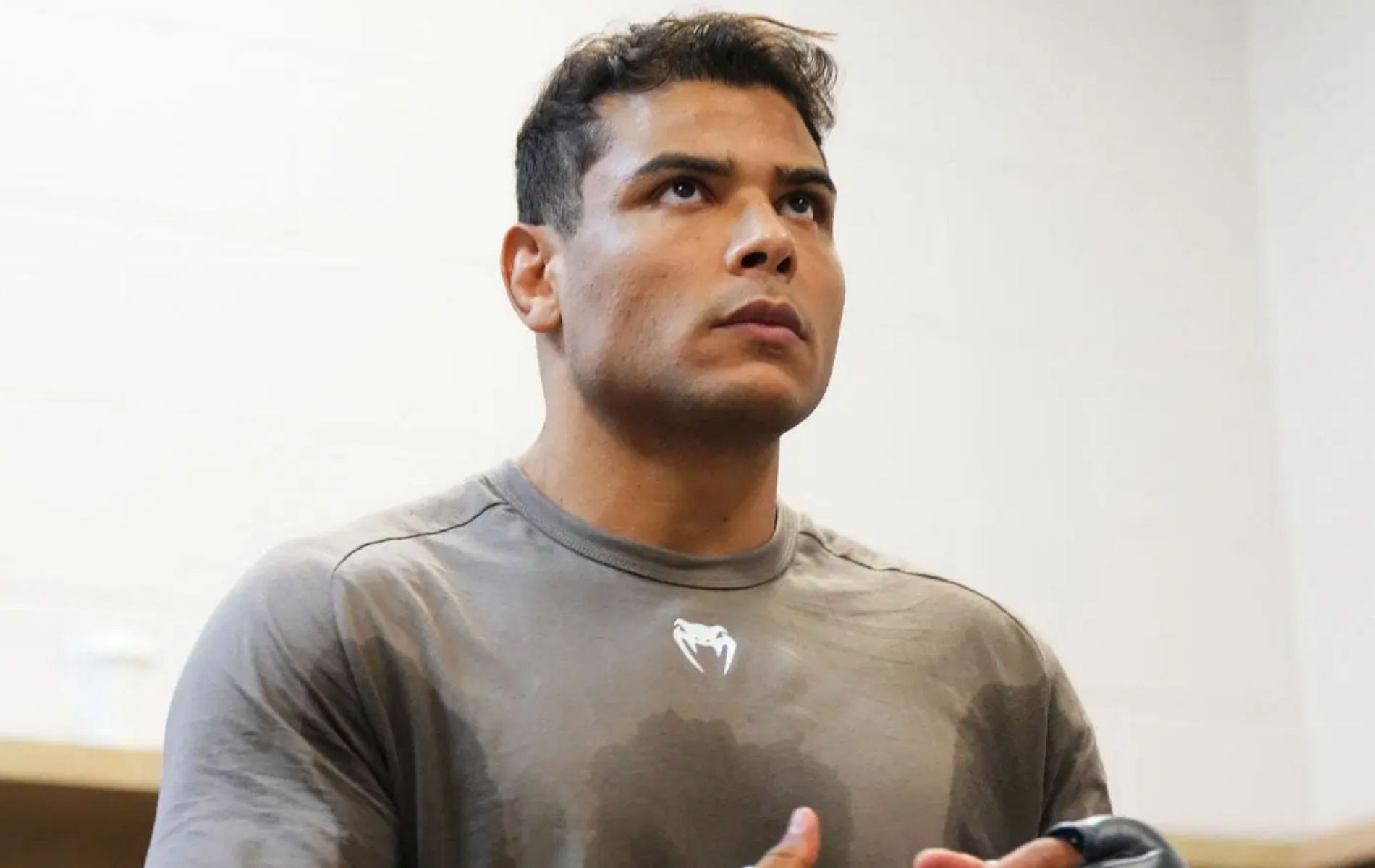 Paulo Costa reacts to fan asking him to preserve energy for Khamzat Chimaev. [Image Courtesy: Getty Images]