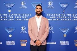 Michael Phelps drops 4-word reaction as former teammate Allison Schmitt gushes over his son Nico's tiny shoes