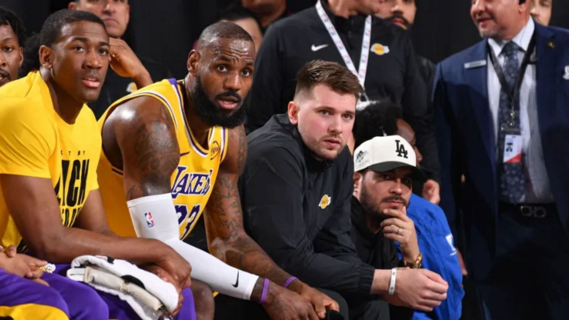 LeBron James (center-left) and Luka Dončić (center-right) on the bench during the Lakers game vs. the Clippers onFeb. 4, 2025