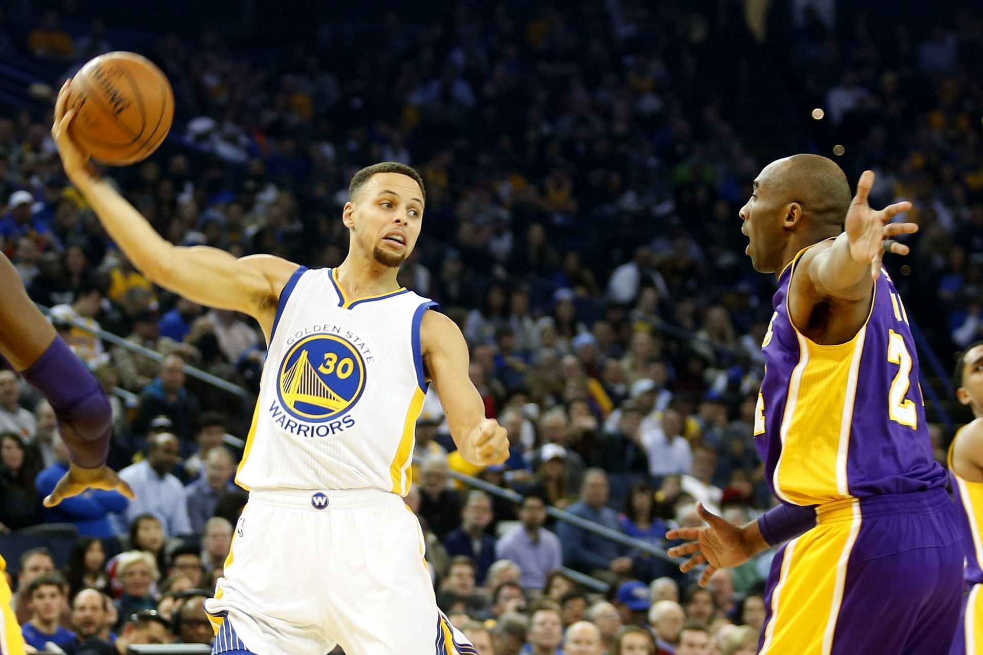 Golden State Warriors&#039; Steph Curry (30) looks to pass against Los Angeles Lakers&#039; Kobe Bryant (24) in the first half of an NBA game at Oracle Arena in Oakland, Calif., on Thursday, Jan. 14, 2016. - Source: Getty