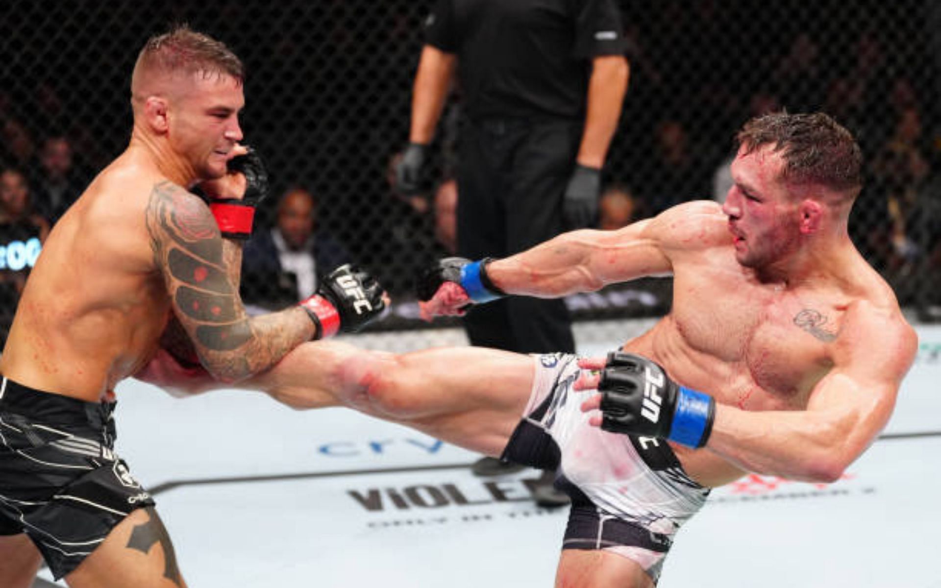 Michael Chandler (right) expresses his admiration for Dustin Poirier (left). [Image courtesy: Getty]