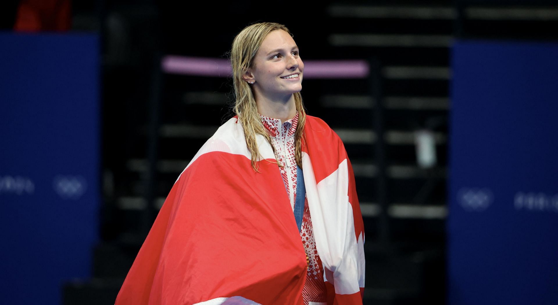 McIntosh with the Canadian flag at the Olympic Games Paris 2024: Day 8 - (Source: Getty)