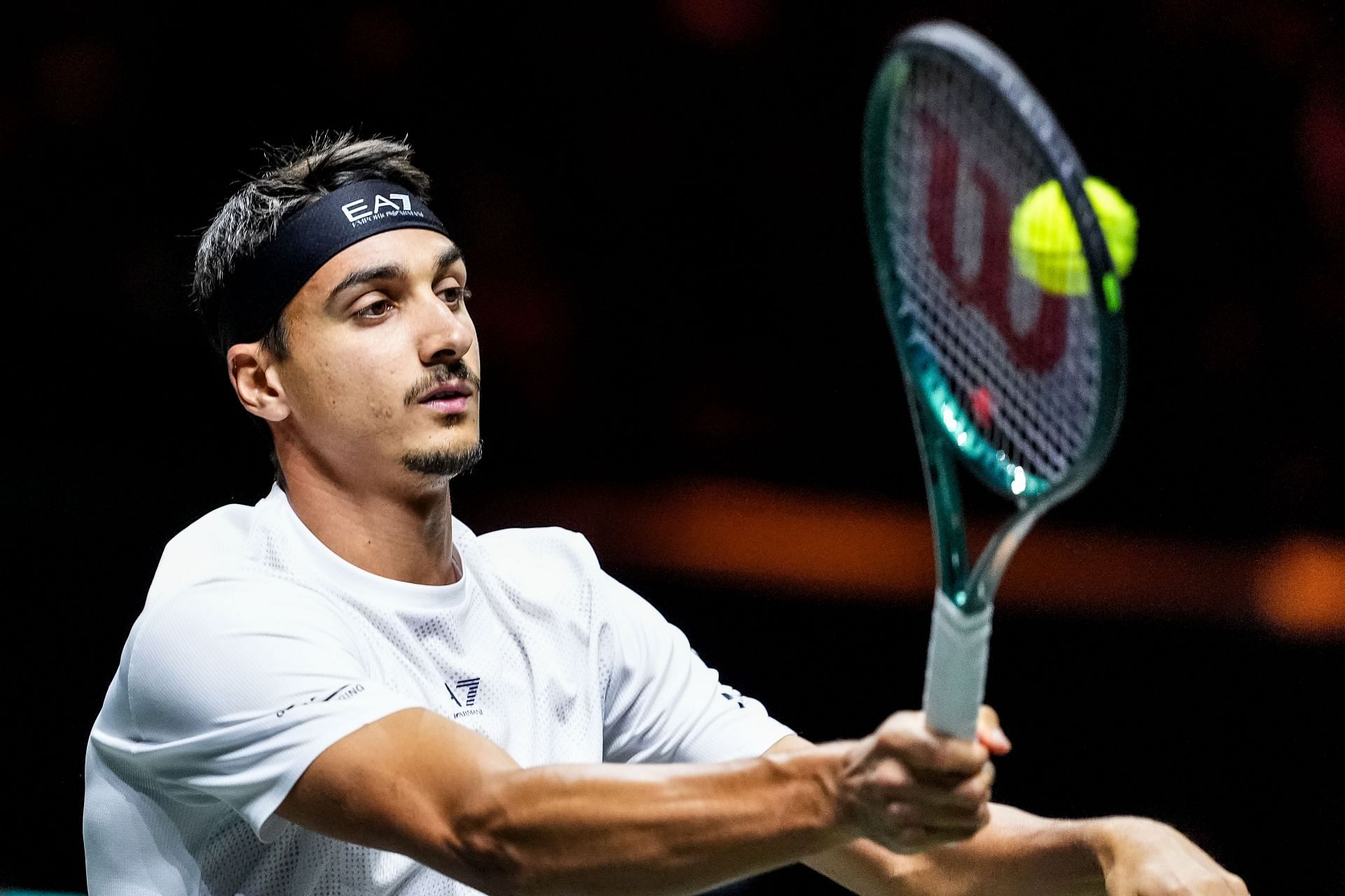 Lorenzo Sonego hits a forehand volley (Source: Getty)