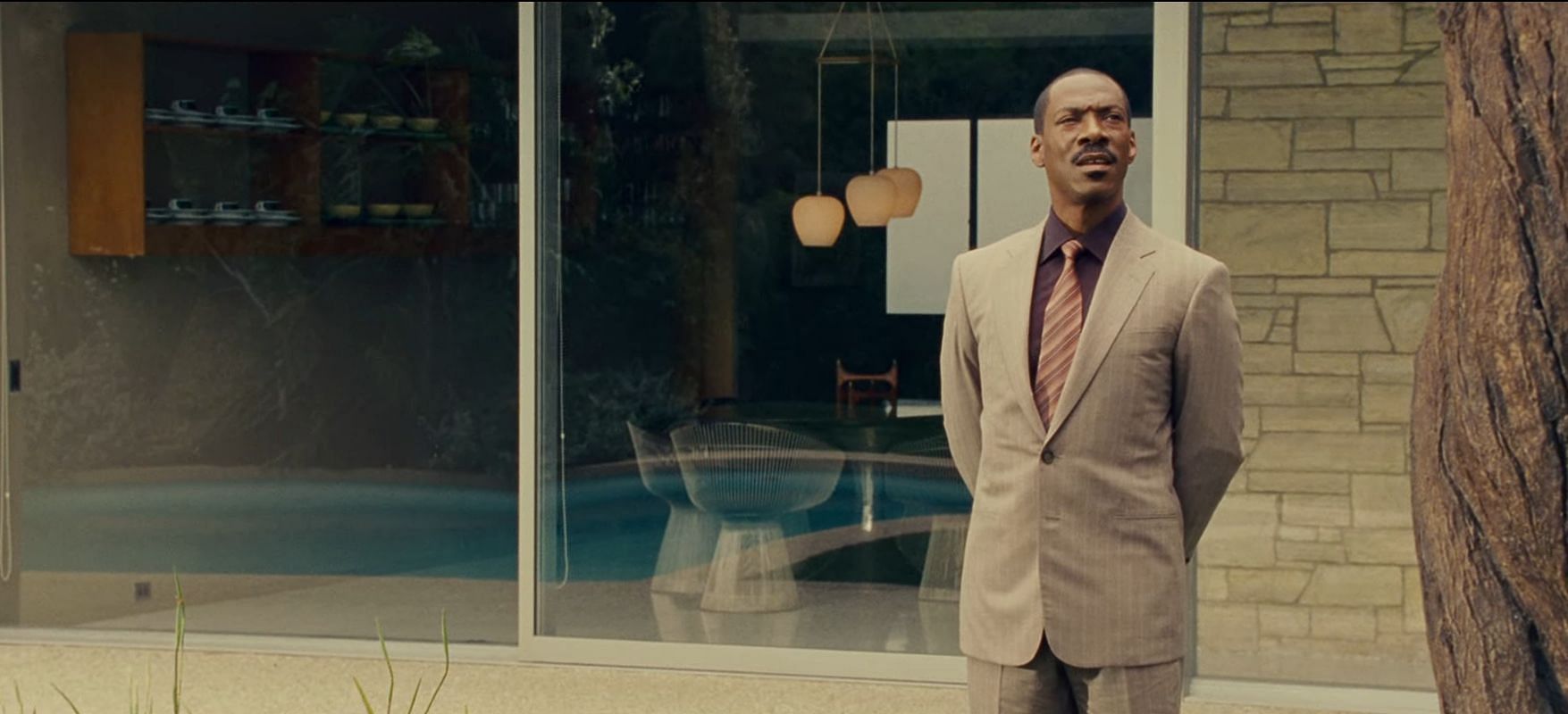 Eddie Murphy in a still from his movie, A Thousand Words. (Image via Netflix)