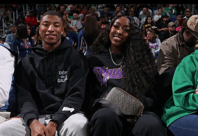 "She in love": College hoops fans react to LSU's Flau'jae Johnson & BF Chris Hilton Jr. enjoying the New Orleans Pelicans vs. Boston Celtics game