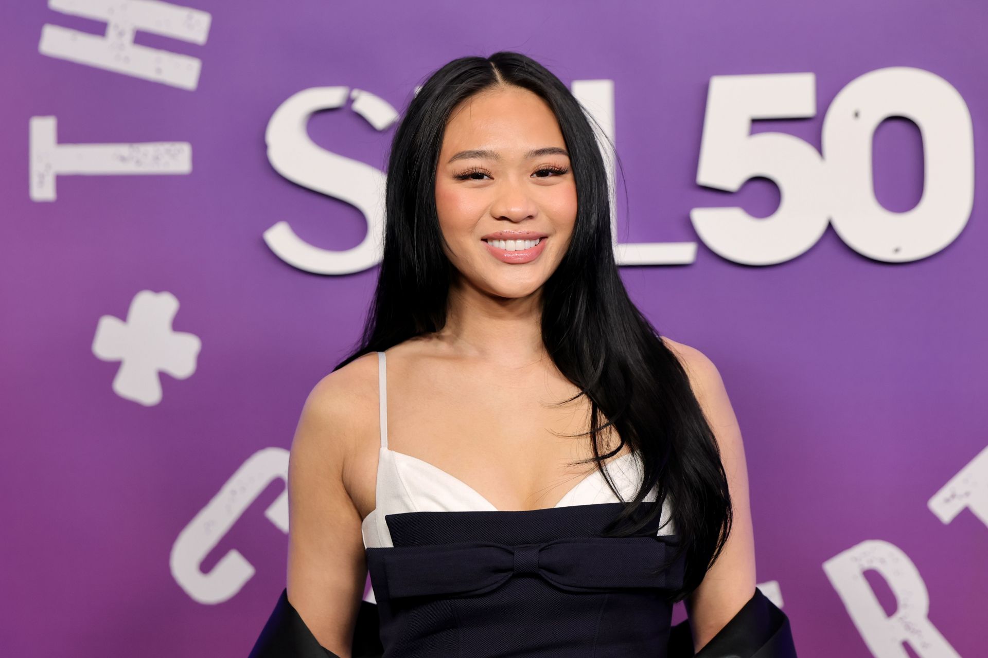Suni Lee turns up the glamor in an unique outfit as she meets Renzo Rosso at the Milan Fashion Week