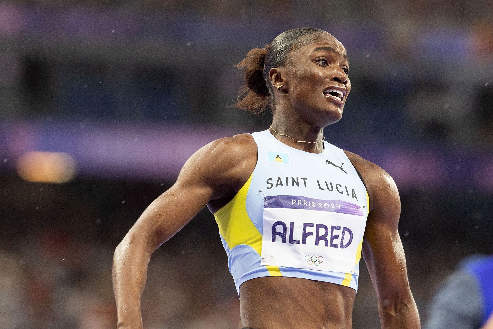 Julien Alfred of Team Saint Lucia celebrates winning the gold medal at the Olympic Games 2024 in Paris, France. (Photo via Getty Images)