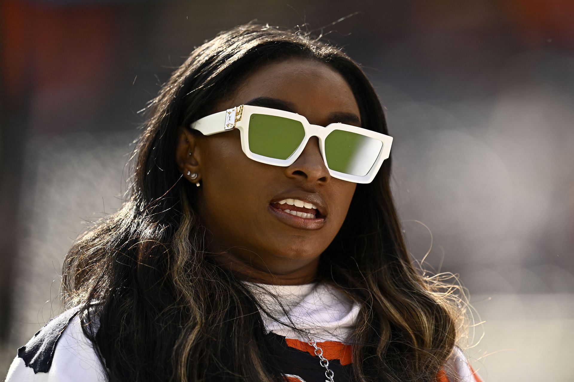 Simone Biles makes an appearance during the match between the New England Patriots and the Chicago Bears - Source: Getty