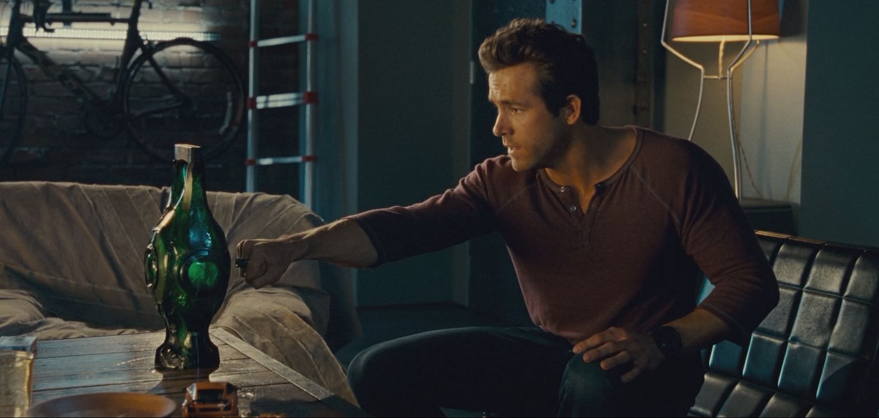 Ryan Reynolds, in a still from The Green Lantern. (Image via Apple TV)