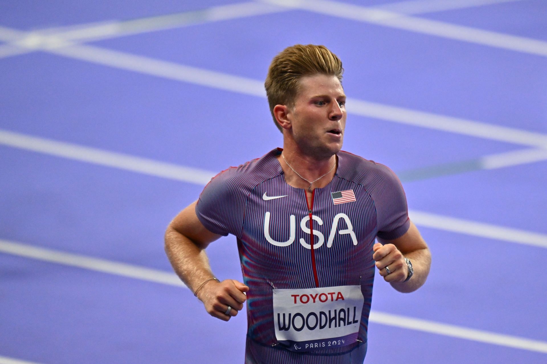 Woodhall running on the track at the Paris 2024 Summer Paralympic Games: Day 4 - (Source: Getty)