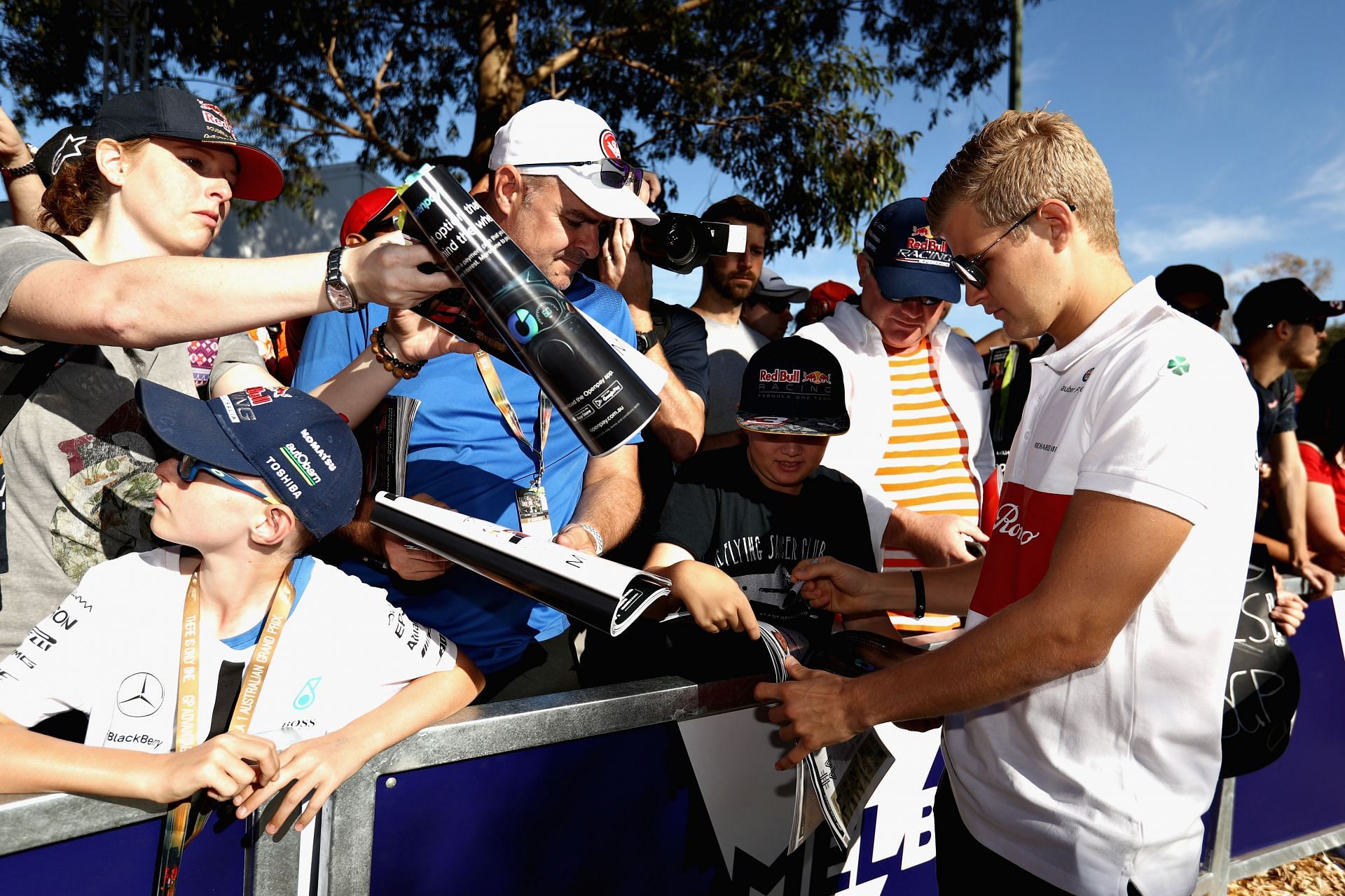 Marcus Ericsson signs autographs for fans before practice for the Australian Formula One Grand Prix - Source: Getty