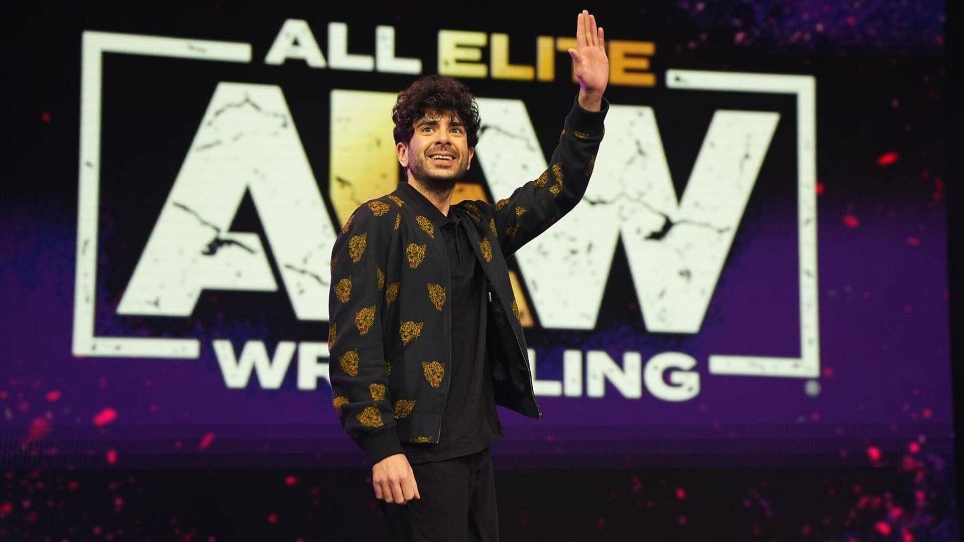 AEW President Tony Khan waves to his fans