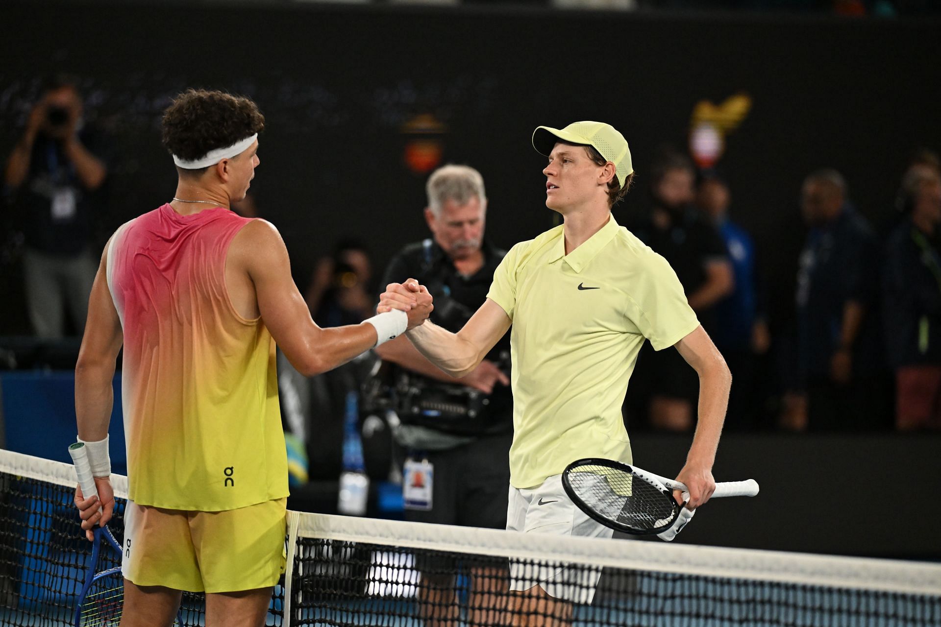 Ben Shelton (L) and Jannik Sinner (R) at the 2025 Australian Open semifinal - Source: Getty