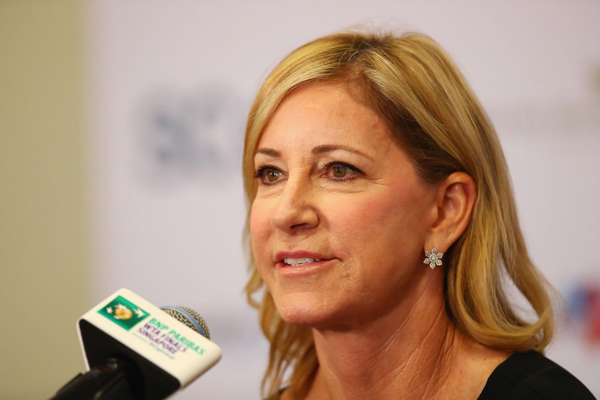 Chris Evert pictured at a press conference | Image Source: Getty