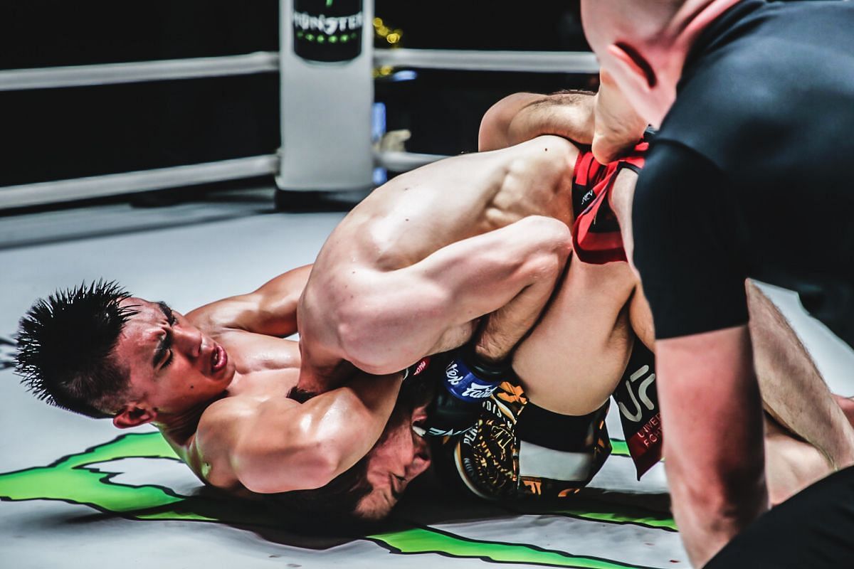 Joshua Pacio attempting to submit Mansur Malachiev. [Photo via: ONE Championship]