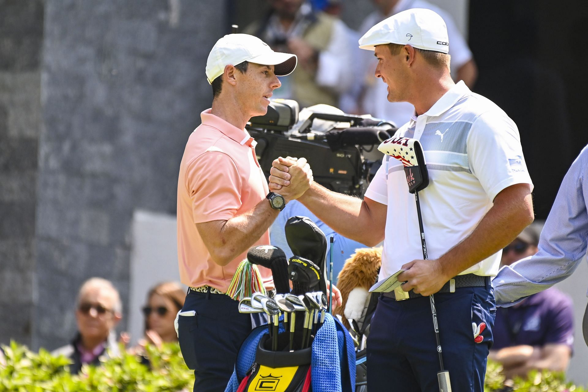 Rory McIlroy shakes hand with Bryson DeChambeau - Source: Getty