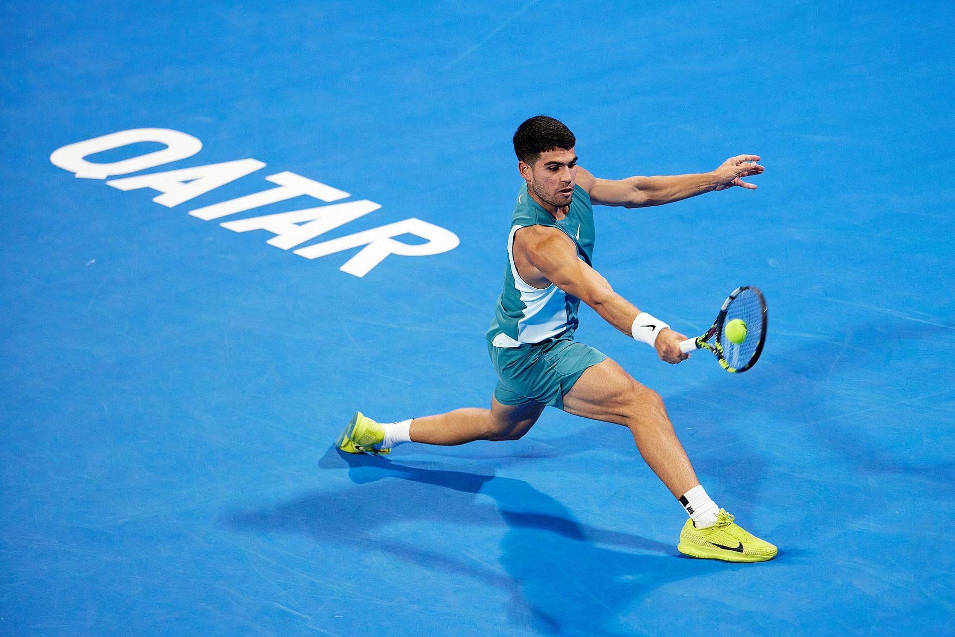 Alcaraz reaches for a backhand slice in the Qatar Open - Source: Getty