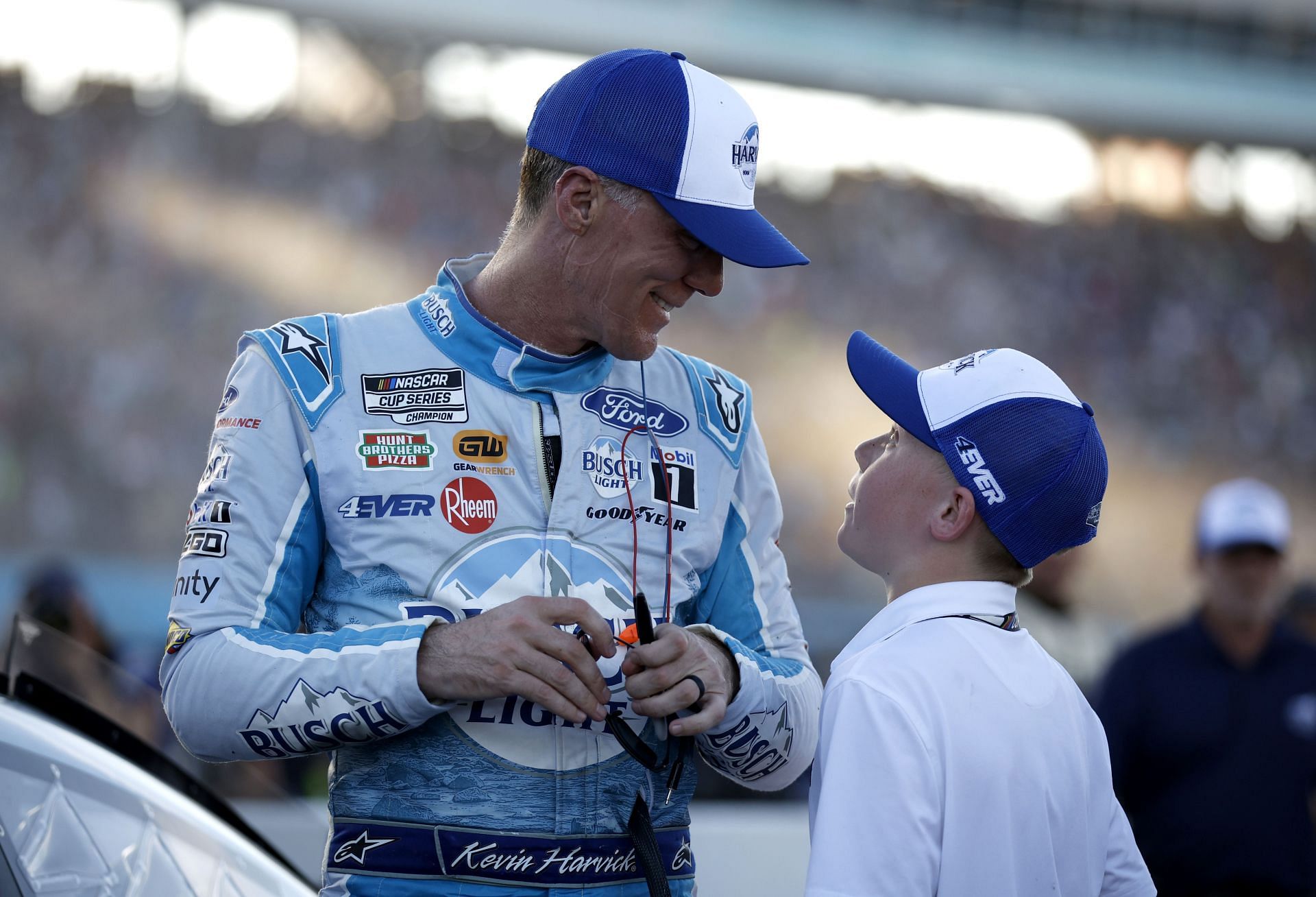 AVONDALE, ARIZONA - NOVEMBER 05: Kevin Harvick, driver of the #4 Busch Light Harvick Ford, spends time with his son, Keelan Paul Harvick after the NASCAR Cup Series Championship at Phoenix Raceway on November 05, 2023 in Avondale, Arizona. (Photo by James Gilbert/Getty Images) - Source: Getty