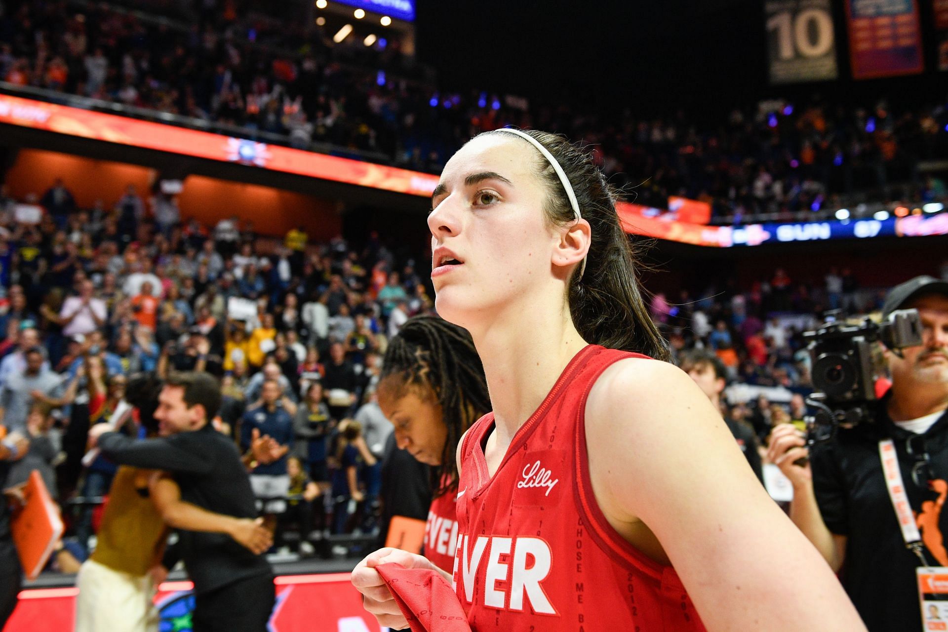 Fever fans react after Caitlin Clark electrifies Indiana fans in Pacers game. -- Photo by GETTY 