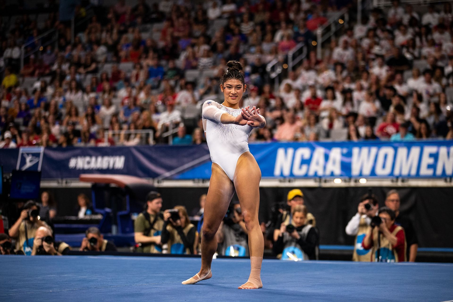 DiCello at the Dickies Arena performing the floor exercises routine during the 2023 NCAA Gymnastics Championships (Image via: Getty Images)