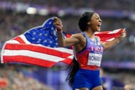 Sha'Carri Richardson celebrates after running the anchor leg of the team's gold medal win in the Women's 4 x 100m Relay Final during the Paris 2024 Summer Olympic Games - Source: Getty