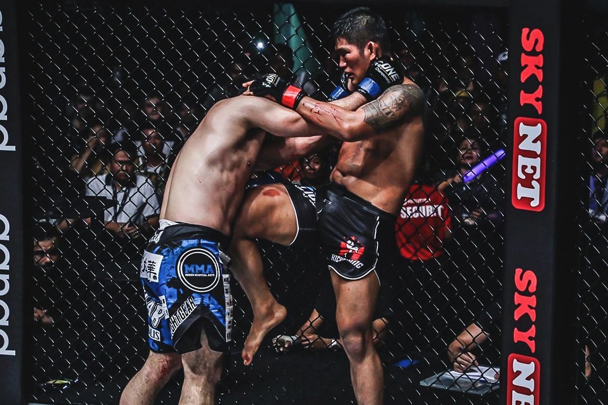 Ken Hasegawa (left), Aung La N Sang (right) [Photo via ONE Championship]