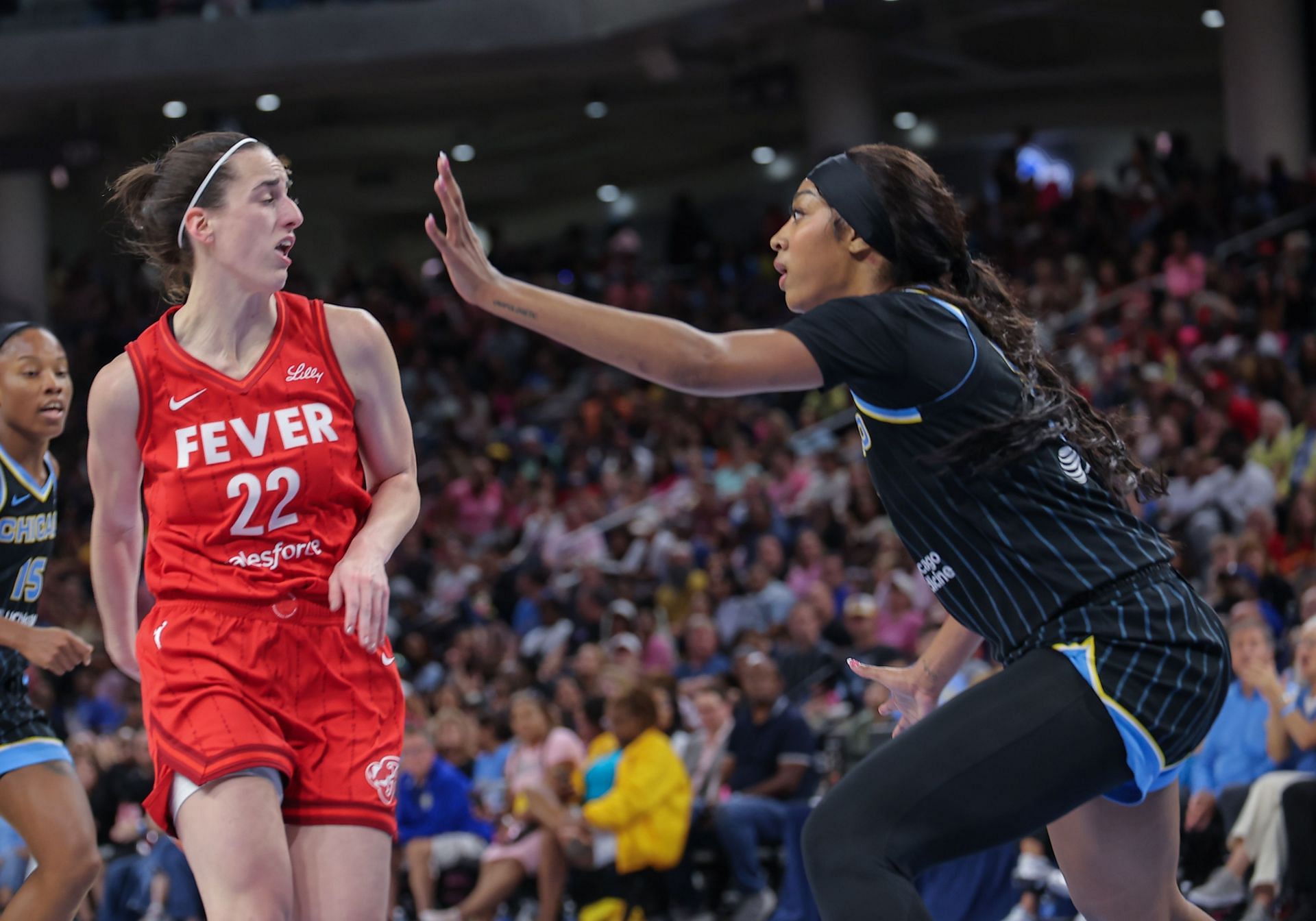 Caitlin Clark going up against Angel Reese in WNBA action - Source: Getty