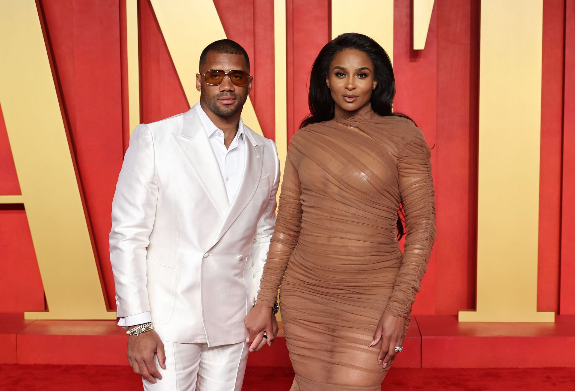 BEVERLY HILLS, CALIFORNIA - MARCH 10: (L-R) Russell Wilson and Ciara attend the 2024 Vanity Fair Oscar Party Hosted By Radhika Jones at Wallis Annenberg Center for the Performing Arts on March 10, 2024 in Beverly Hills, California. (Photo by Jamie McCarthy/WireImage) - Source: Getty