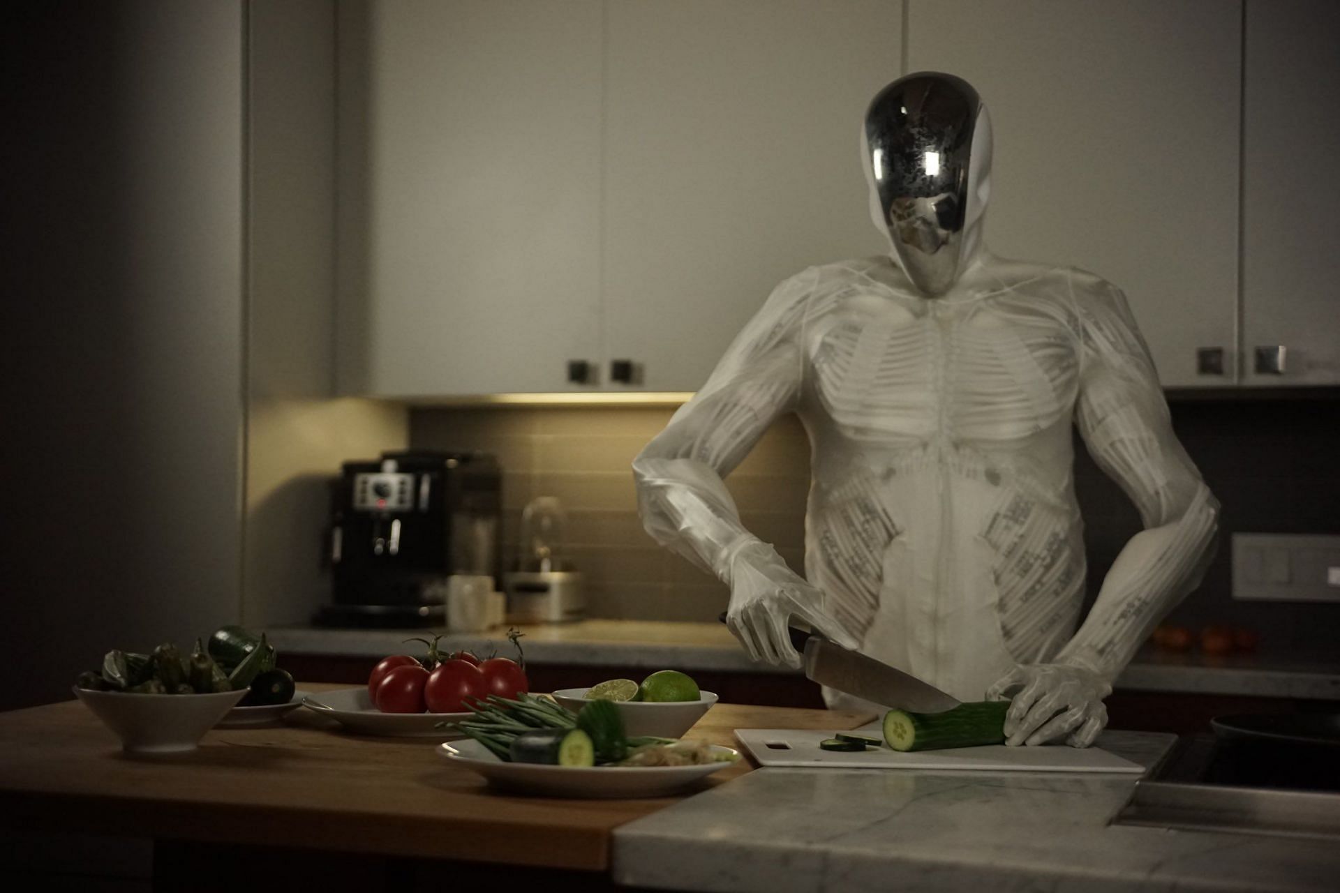 A still of Torso 2 by Clone Robotics working in the kitchen. (Image via X/@clonerobotics)