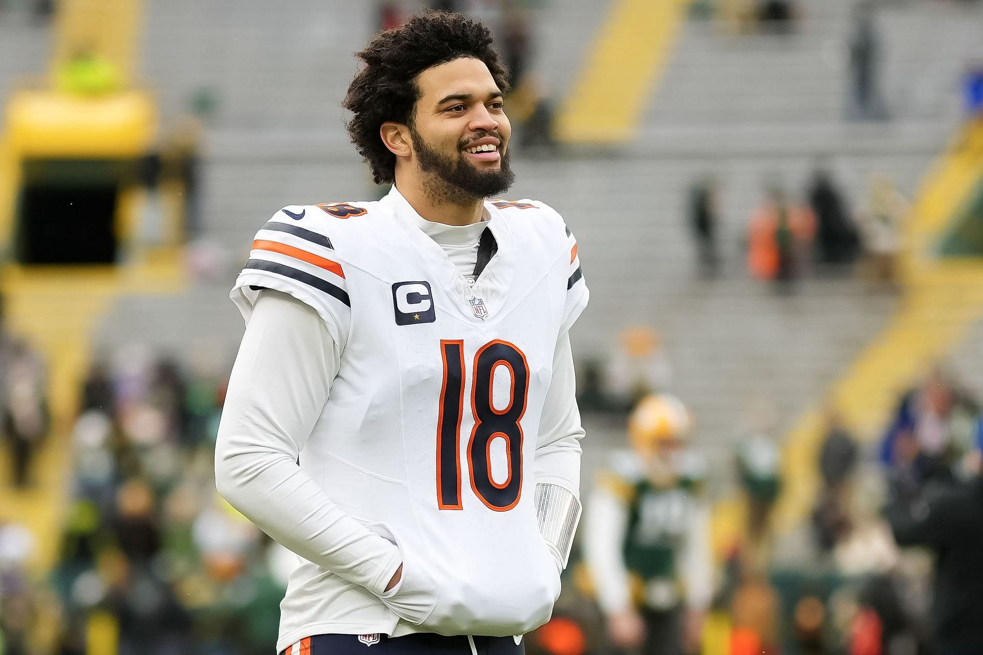 Caleb Williams looks on during a football game - Source: Getty