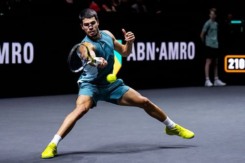 Carlos Alcaraz in action at the ABN AMRO Open (Image Source: Getty)