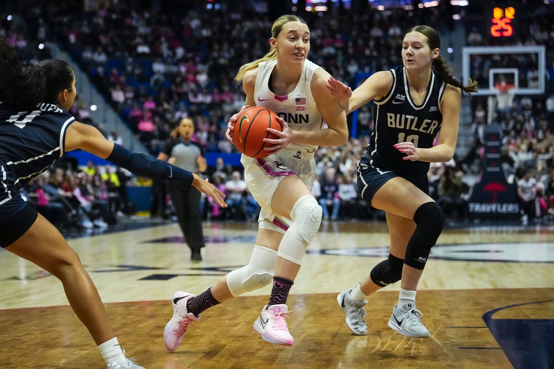 Paige Bueckers (#5) of the UConn Huskies drives to the rim against Lily Carmody (#12) of the Butler Bulldogs during the first half of their NCAA women&#039;s basketball game at the XL Center on February 2, 2025 in Hartford, Connecticut. Photo: Getty