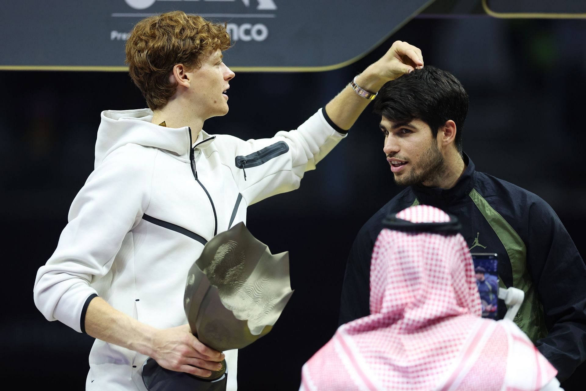 Jannik Sinner and Carlos Alcaraz during the trophy ceremony at Six Kings Slam (Source: Getty)