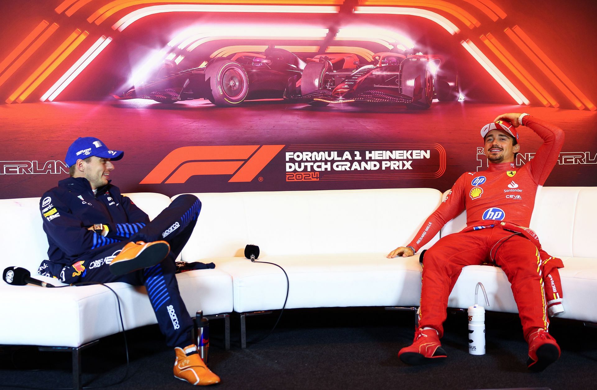 Max Verstappen [L] with Charles Leclerc [R] (Image Source: Getty)