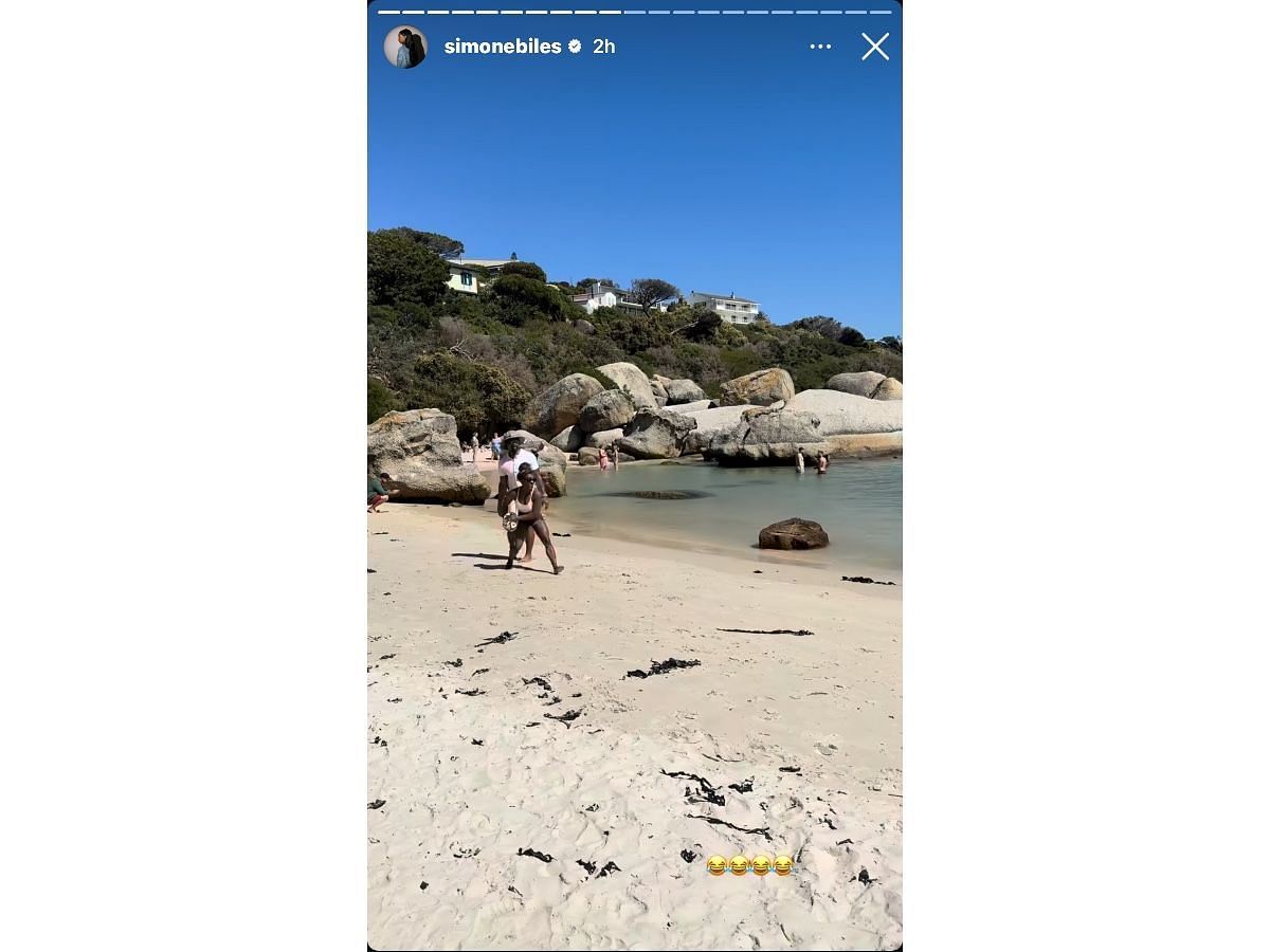 Biles and Owens playing soccer on the beach