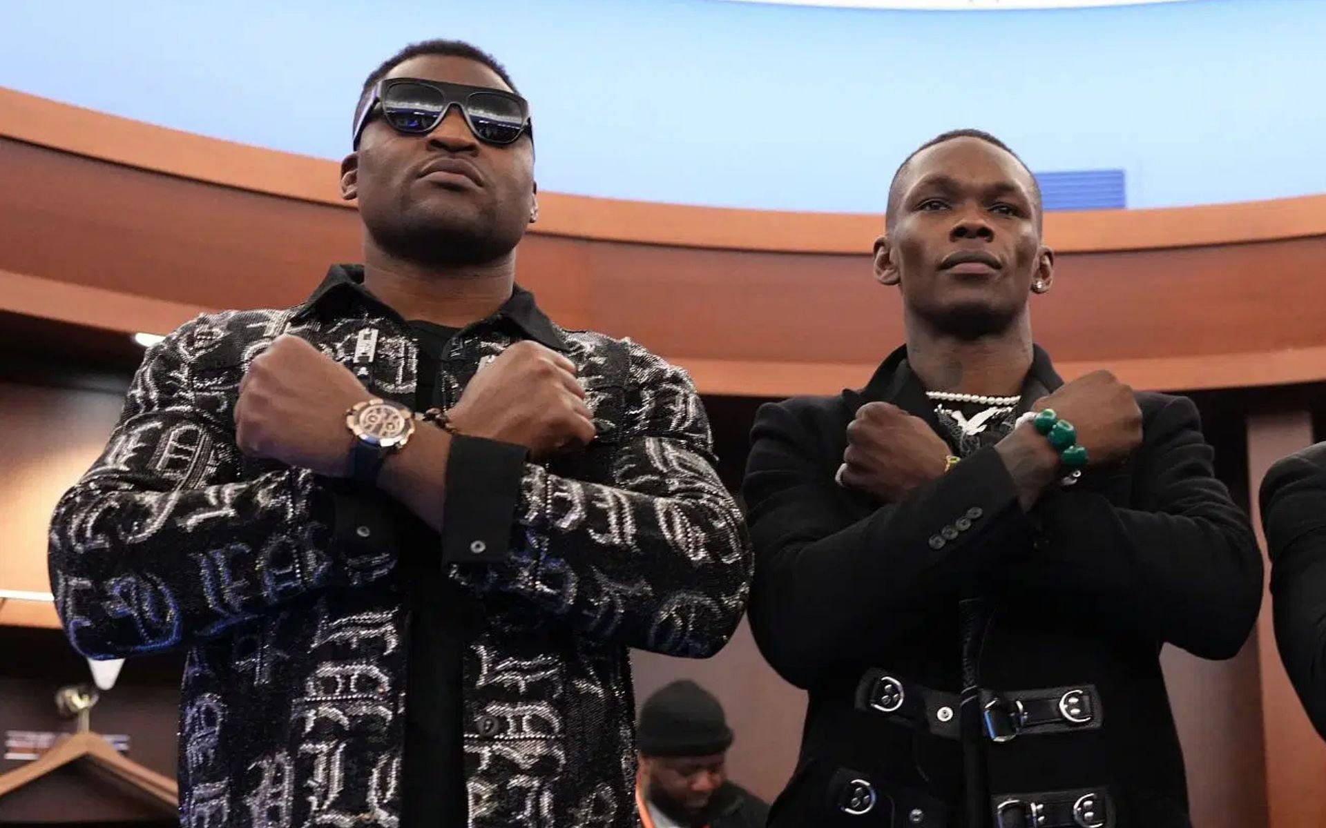 Francis Ngannou (left) sends a message to Israel Adesanya (right) [Image courtesy: Getty]