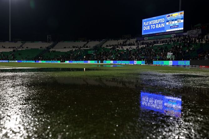 Groundstaff member slips badly and falls while trying to clear water after rain interruption in AFG vs AUS 2025 Champions Trophy match [Watch]