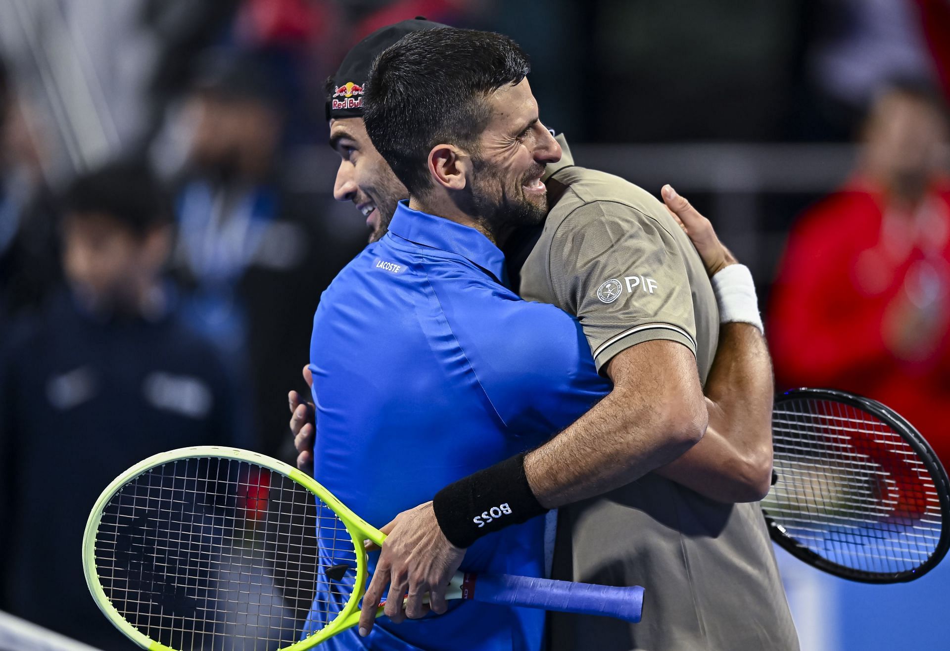 Matteo Berrettini embraces Novak Djokovic after defeating him - Source: Getty