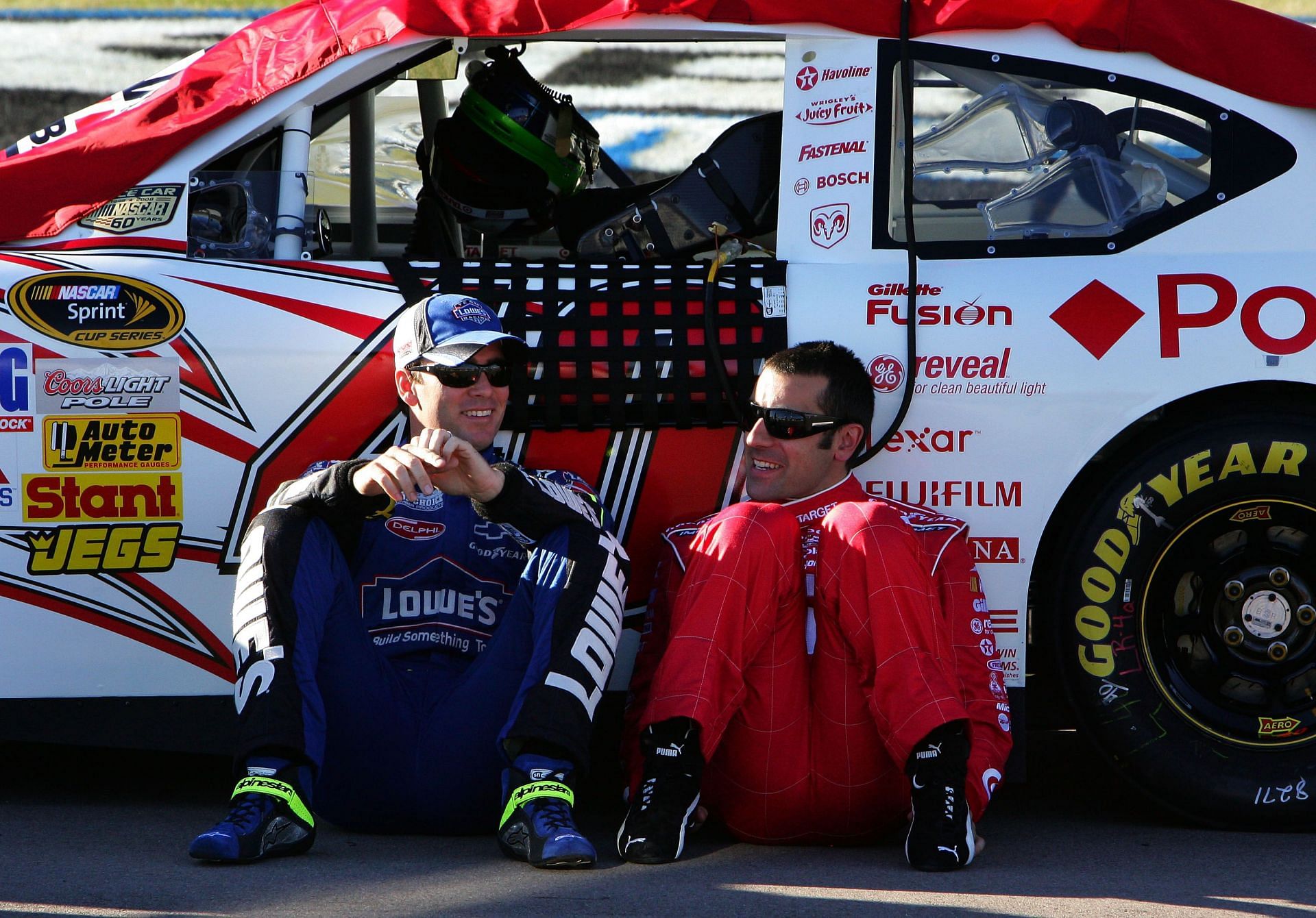 Franchitti and Jimmie Johnson at the 2008 NASCAR Sprint Cup Series UAW-Dodge 400 Qualifying - Source: Getty