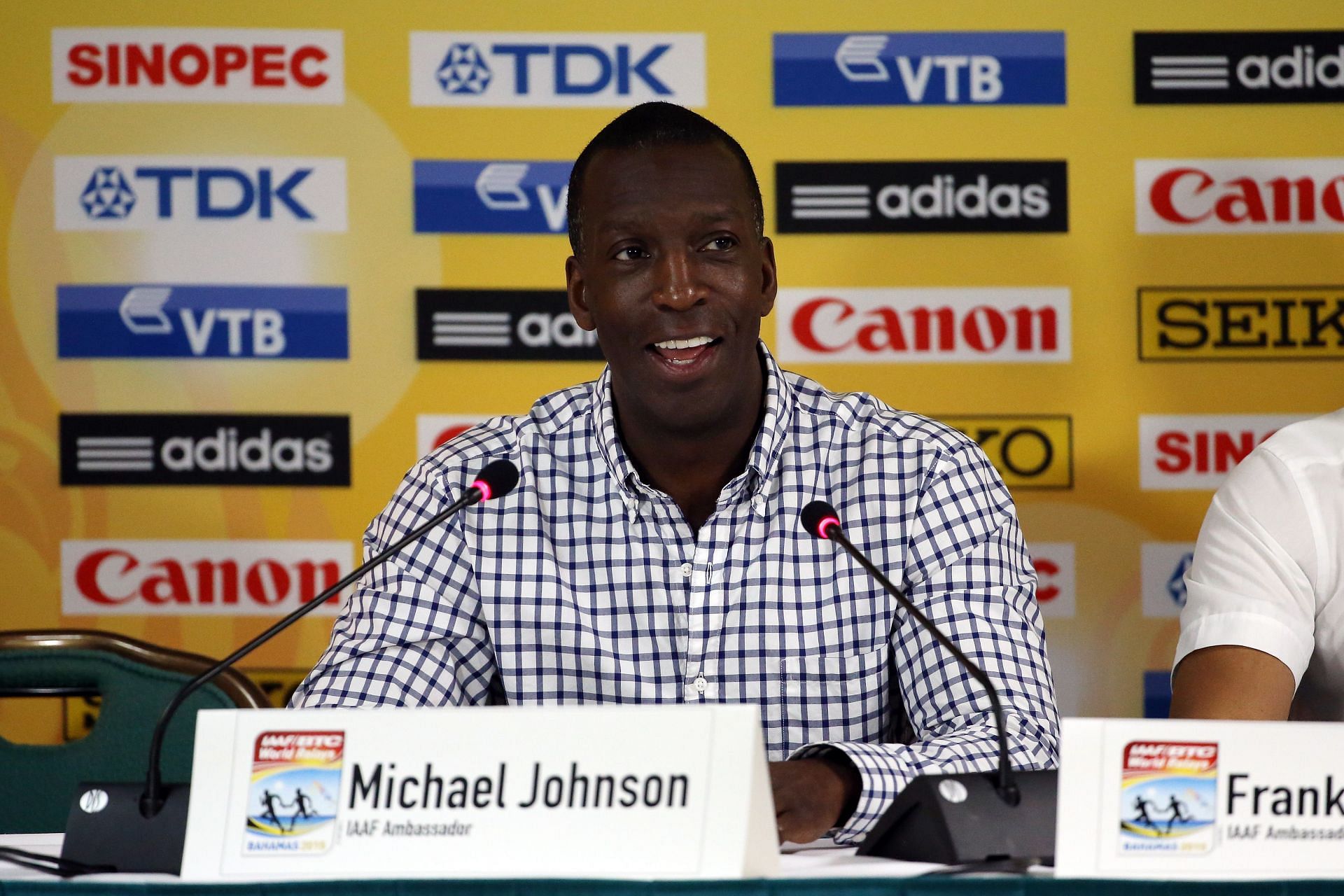 Michael Johnson speaking at the IAAF/LOC Press Conference - (Source: Getty)