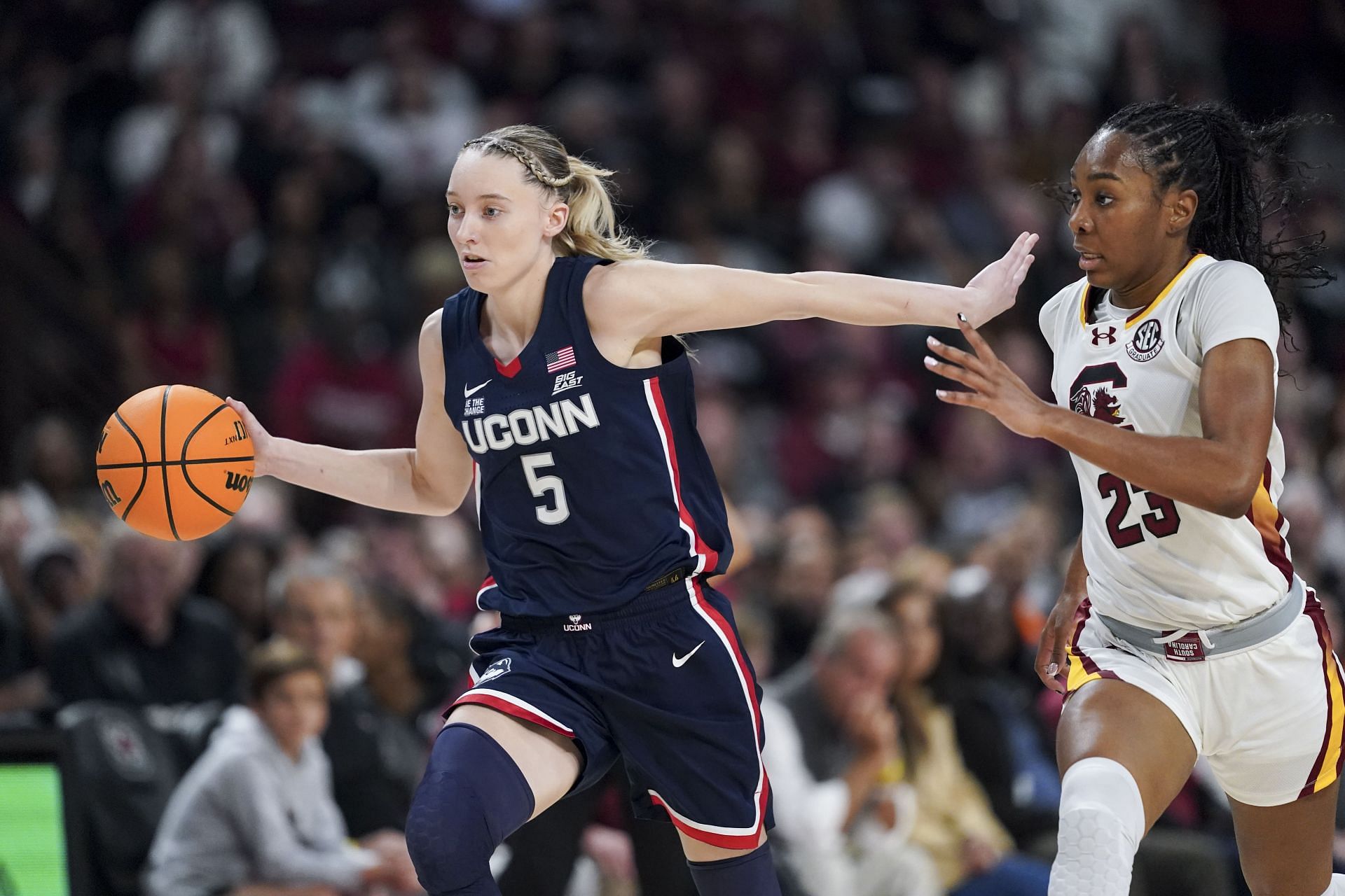 Paige Bueckers (#5) of the UConn Huskies dribbles the ball past Bree Hall #23 of the South Carolina Gamecocks during the third quarter of their NCAA women's basketball game at Colonial Life Arena on February 16, 2025 in Columbia, South Carolina. Photo: Getty