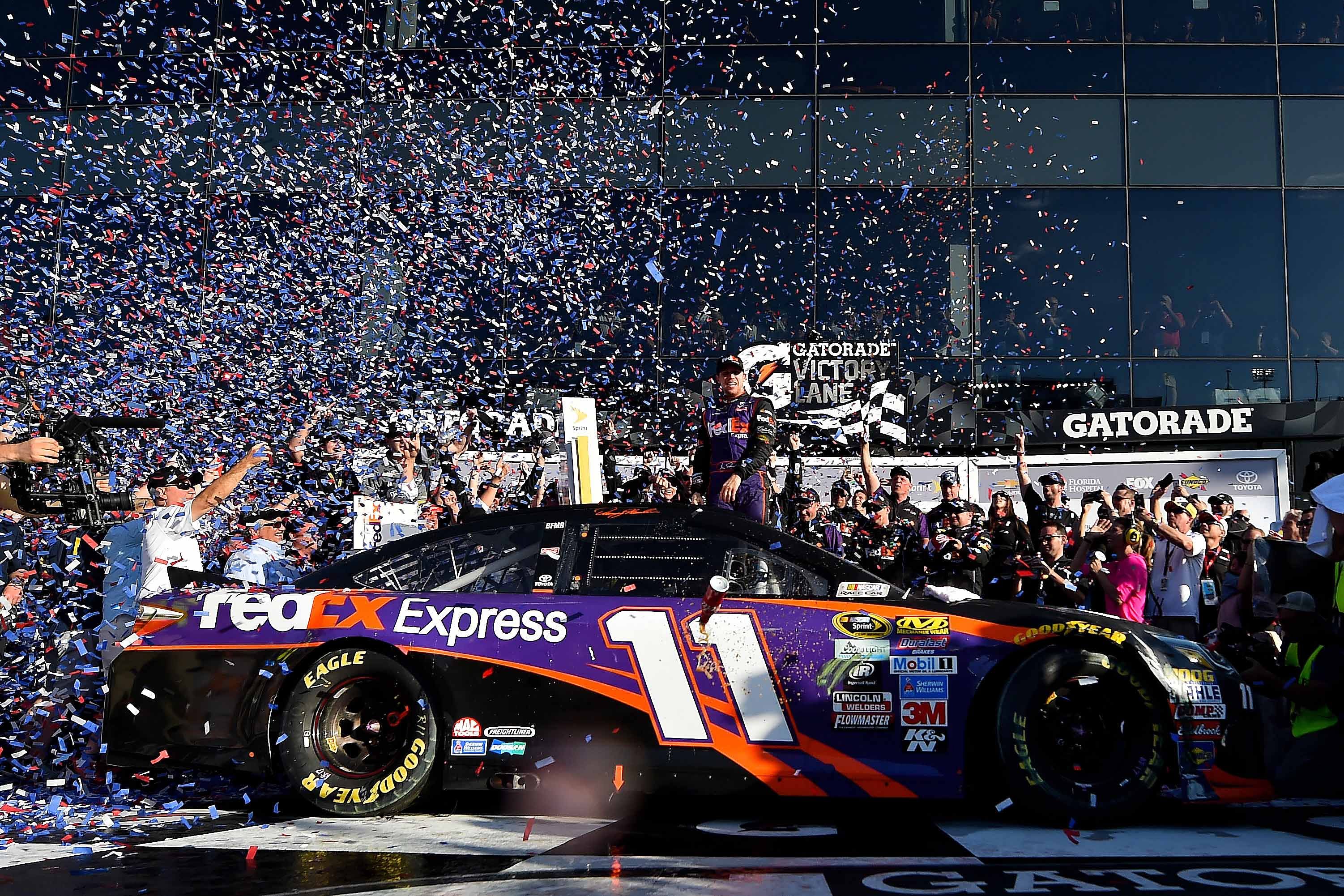 Denny Hamlin (11) celebrates winning the Great American Race, Feb 21st 2016 - Source: Imagn