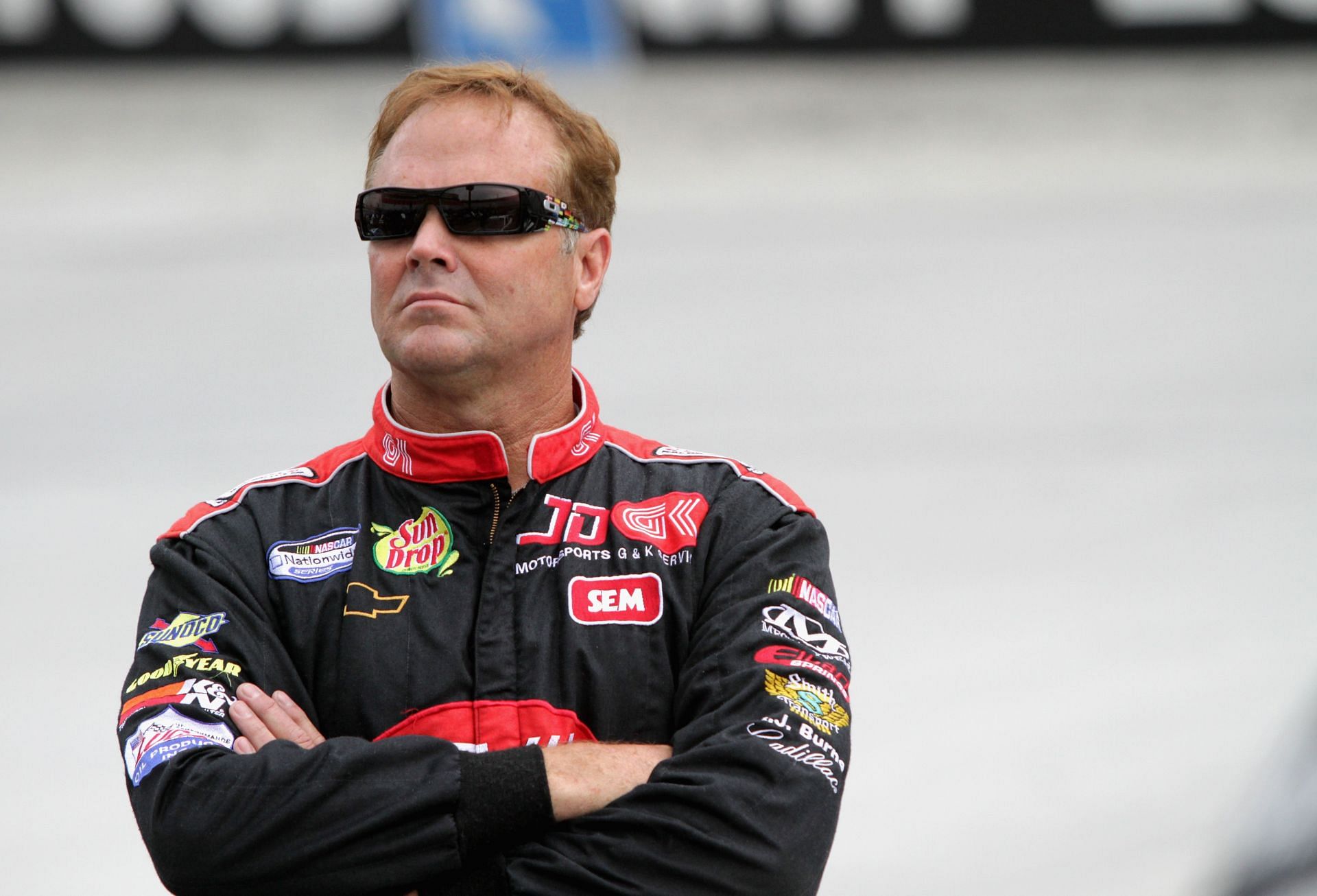 BRISTOL, TN - AUGUST 23:  Mike Wallace, driver of the #01 teamjdmotorsports.com Chevrolet, looks on from the grid during qualifying for the NASCAR Nationwide Series Food City 250 at Bristol Motor Speedway on August 23, 2013 in Bristol, Tennessee.  (Photo by Jerry Markland/Getty Images) - Source: Getty